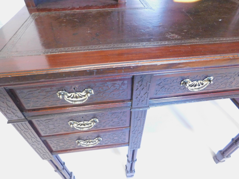 A late 19th/ early 20thC Edwards and Roberts writing table, in Chippendale style, the raised back - Image 2 of 3