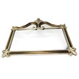 A silvered wall mirror, with a shaped scroll and leaf decorated crest and a rectangular plate, 130cm