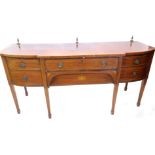 A 19thC mahogany boxwood and ebony strung sideboard in George III style, the breakfront top with