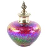 A pink iridescent glass scent bottle, with silver collar and flame finial, Sheffield 1991, 11cm H.