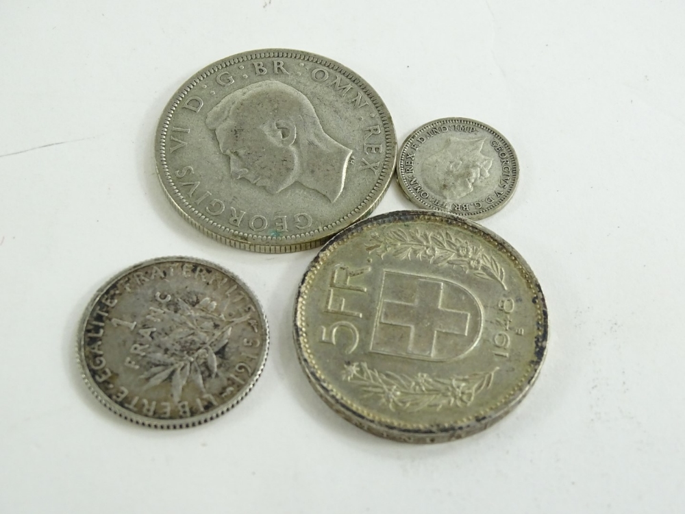 A quantity of mainly silver coins, to include Mexico silver dollar etc. - Image 2 of 3