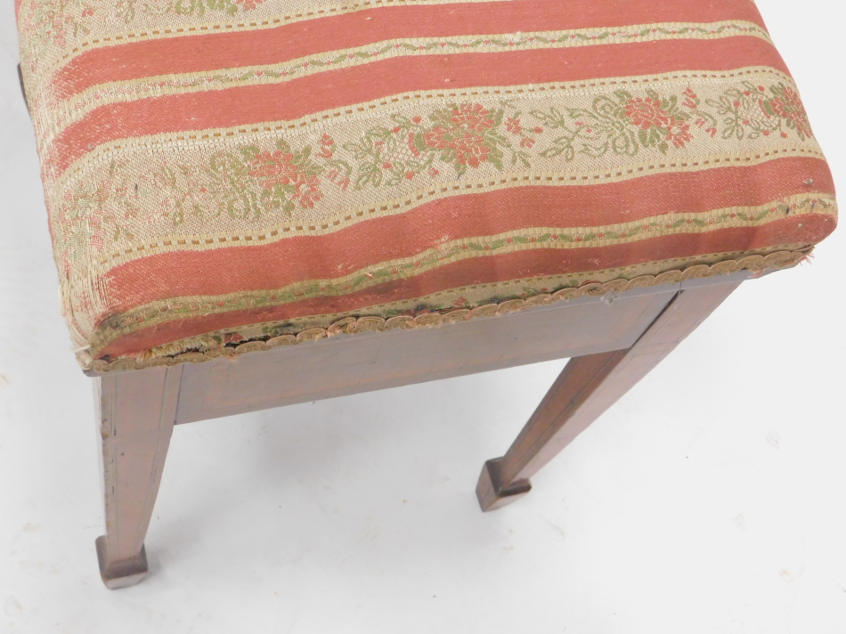 An Edwardian mahogany satinwood cross banded duet stool, with a hinged padded seat on square - Image 3 of 3