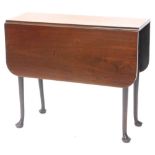 A mahogany drop leaf table, each leaf with rounded corners on turned tapering legs, with pad feet,