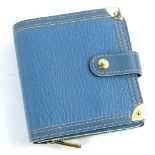 A Louis Vuitton leather bi-fold wallet, in blue, with brass zipper, stamped Louis Vuitton made in