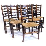 A harlequin set of six Lancashire ash ladder back chairs, each with a rush seat on turned legs