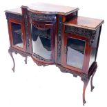 An Edwardian mahogany side cabinet, with a bow fronted glazed door, flanked by two further glazed