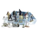 A collection of painted metal Star Wars figures, to include Luke Skywalker, Chewbacca, CP30, Darth