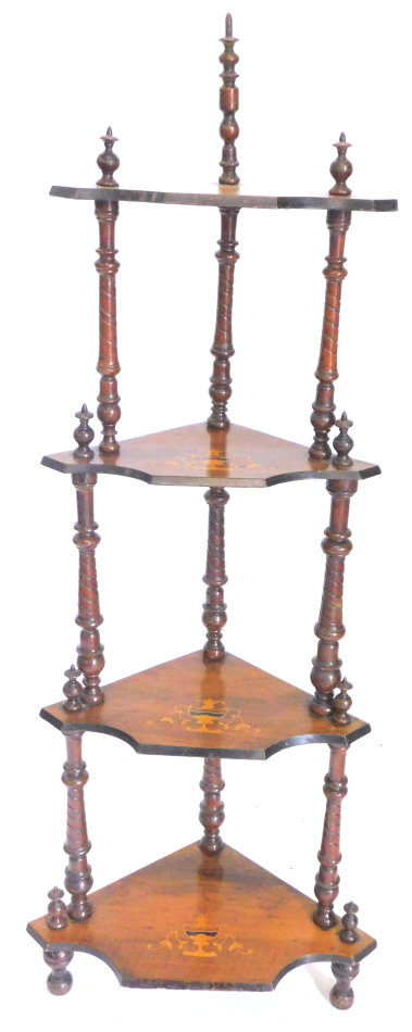 A Victorian walnut three tier corner what-not, each section with marquetry urn, on turned