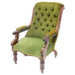 A Victorian mahogany open armchair, with a green buttoned upholstered back, pillared arms and