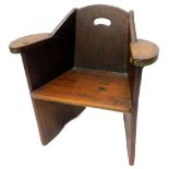 A country made oak chair, with a pierced back, shaped arms and tapering seat, 66cm W.