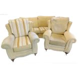 A three piece suite, comprising two seater sofa, two armchairs, some with stripe decoration the