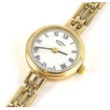 A 9ct gold Rotary ladies wristwatch, with small circular dial, with cream dial, on three row gold