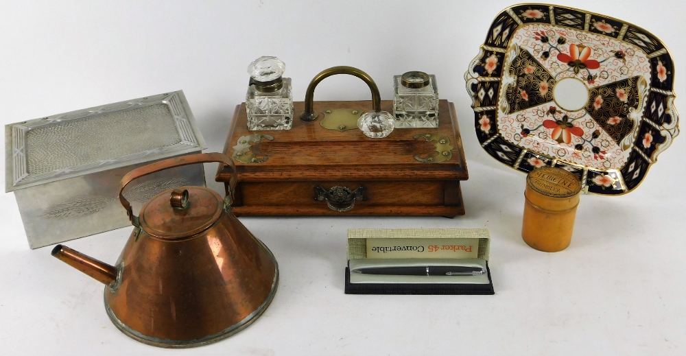 An early 20thC oak inkstand, 31cm W, a Benson type copper kettle, medicine tumbler jar, Arts and