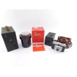 A Kodak Retinette camera, No.2 Brownie camera, a Midg No.4 camera, and a Paterson universal
