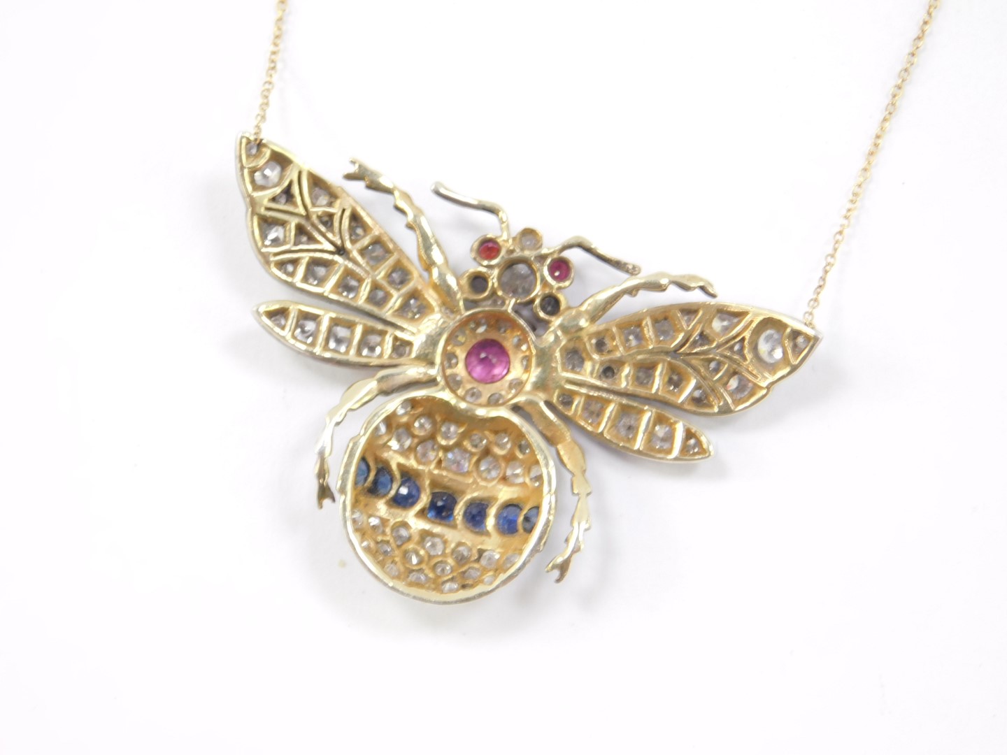 A Victorian diamond ruby and sapphire bumble bee pendant necklace, set in yellow metal on an 18ct - Image 3 of 4