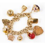 A 9ct gold charm bracelet, with nine charms, some stone set, 91.4g all in.