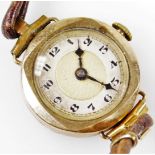 A Buren 9ct cased lady's wristwatch, on a leather strap.