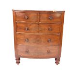 A Victorian mahogany bow front chest of drawers, with two short over three long graduated drawers,