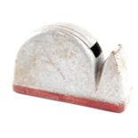 A mid 20thC industrial grey metal office Sellotape dispenser, on a rectangular base, painted red, on