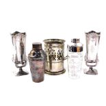 An Art Nouveau silver plated vase holder, 18cm H, a pair of Victorian plated glass vase holders,