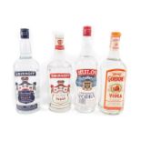 A bottle of Gordon's Vodka, 1lt, Smirnoff, 1.13lt, 50% proof, and a further 1.13lt bottle 80% proof,