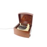 A BSR Monarch mahogany cased record player, with Pye cream metal and Bakelite fitted interior, the