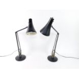 A pair of anglepoise black model 90 desk lamps, 90cm H extended.