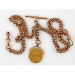 A 9ct gold chain and T bar, set with a gold 1918 sovereign with yellow metal mount,