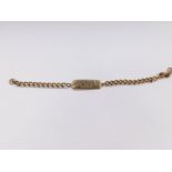A 9ct gold curb link identity bracelet, clasp lacking, 24.3g.