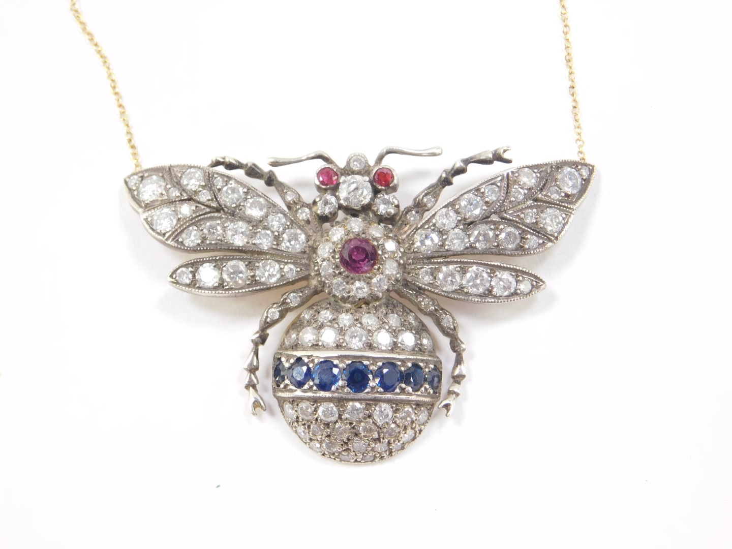 A Victorian diamond ruby and sapphire bumble bee pendant necklace, set in yellow metal on an 18ct - Image 2 of 4