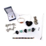 Silver and costume jewellery, including an ammonite necklace, two charm bracelets and jet set