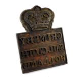 A Victorian cast iron sail cloth stamp, bearing a crown above "Grimsby Sail Cloth Holland", with a