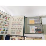 Philately. QEII mint commemorative stamps, in packs and loose, first day covers and postcards. (
