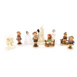 Four Royal Doulton figures, comprising The Enchantment Collection, The Magpie Ring HN2978, and April