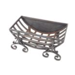 A cast iron fire basket, of bowed form, raised on scrolling feet, 33cm H, 71.5cm W, 42cm D.