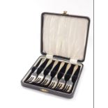 A set of six silver cake forks, cased, Sheffield 1954, 5.57oz.