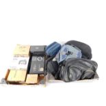 An assortment of camera bags, together with Nikon and Panasonic and other camera and accessory