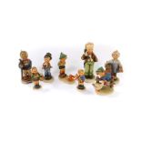 Eight Hummel figures, comprising Little Hiker, Serenade, Sensitive Hunter, Christmas Gift, Village