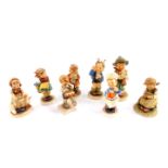 Eight Hummel figures, comprising Be Patient, Busy Student, Baker, Lost Sheep, Mother's Helper, Boy
