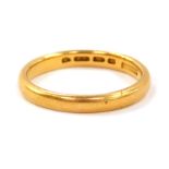 A 22ct gold wedding band, size M/N, 3.1g.