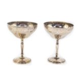 A pair of silver goblets, engraved with floral swags, Birmingham 1970, 9.19oz.