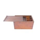 A Victorian stained pine writing box, of rectangular section, the sliding lid opening to reveal a