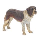 An early 20thC cold painted bronze figure of a St Bernard Dog, raised 'Foreign' mark, 18cm L.