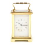 A Bayard brass cased carriage clock, the white dial bearing Roman numerals, eight day movement,