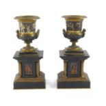 A pair of late 19thC marble and gilt brass clock garniture urns, of neoclassical Campana form,