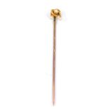A Victorian triple seed pearl stick pin, set in yellow metal, 1.8g all in.