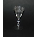 A continental 18thC wine glass, possibly French, the bowl engraved with flowers and scrolling