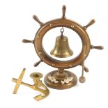 An oak and brass table gong, of Capstan wheel and Bell form, raised on a circular base, with reef
