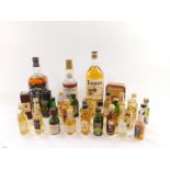 Three bottles of Teachers Highland Cream Scotch Whisky, Southern Comfort & Jack Daniels, together