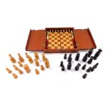 A Victorian mahogany cased travelling chest set, with bone chess pieces, the case of folding